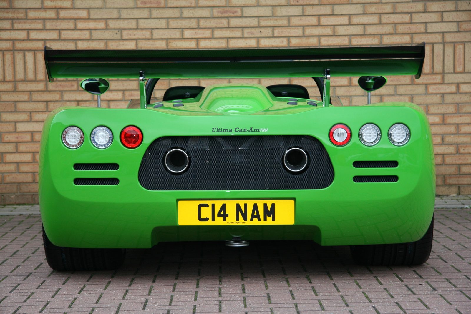 Rear view of a green Ultima Can-Am