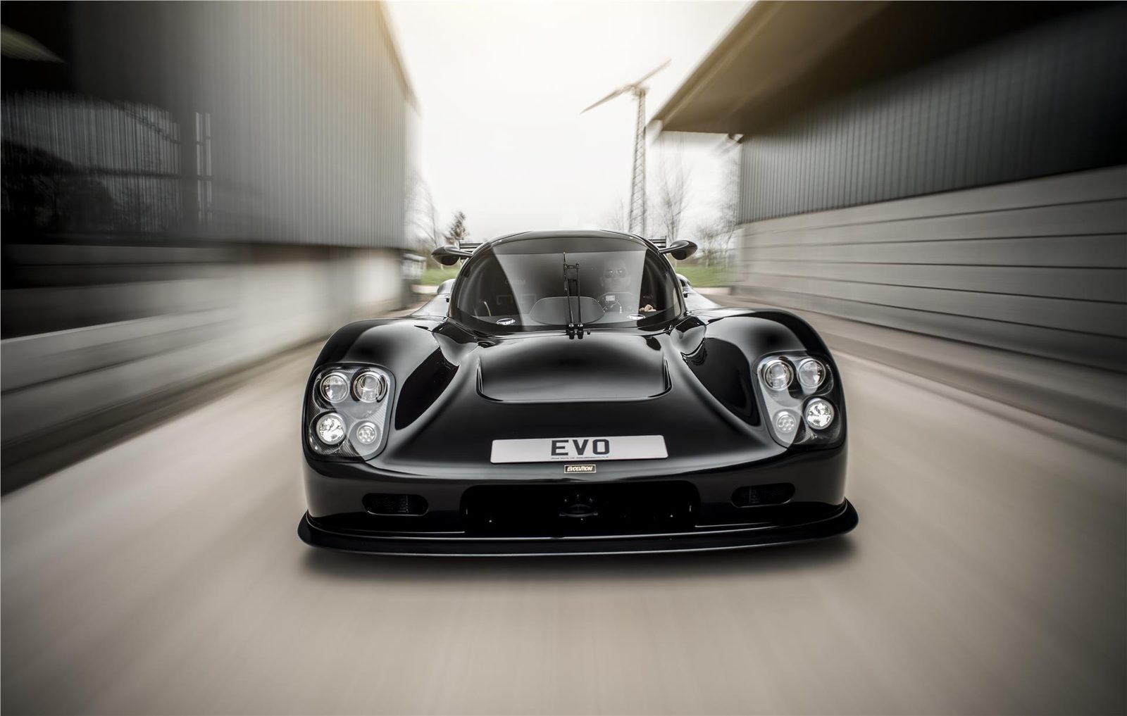 Black Ultima Evolution Coupe photographed head-on
