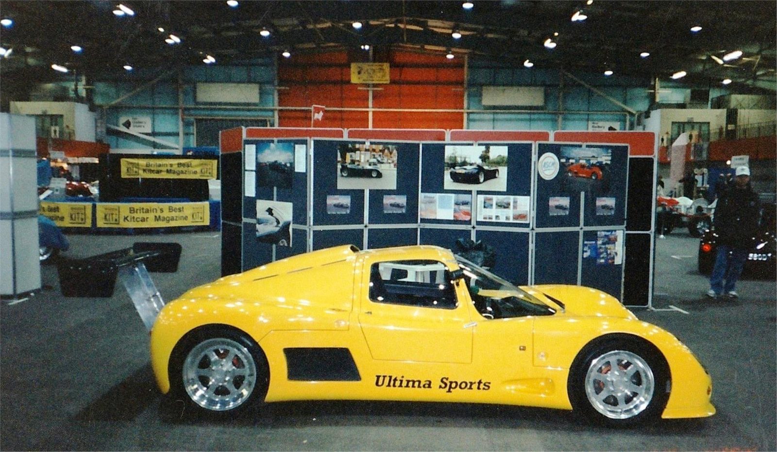 Yellow Ultima Sport displayed indoors