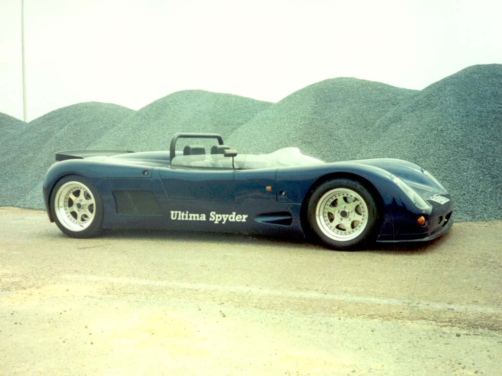 A blue Ultima Spyder photographed from the side