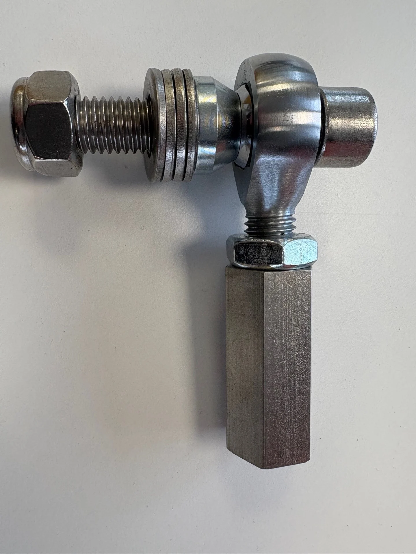 Single bump-steer adjuster shown from the side