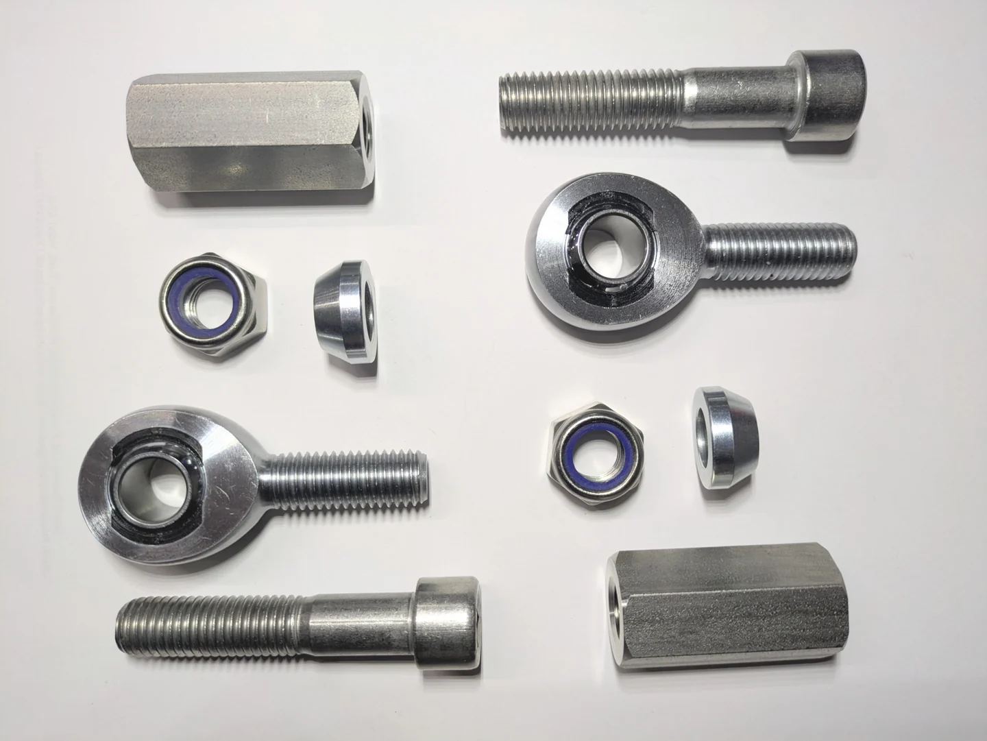 Bump-steer kit components laid out before assembly