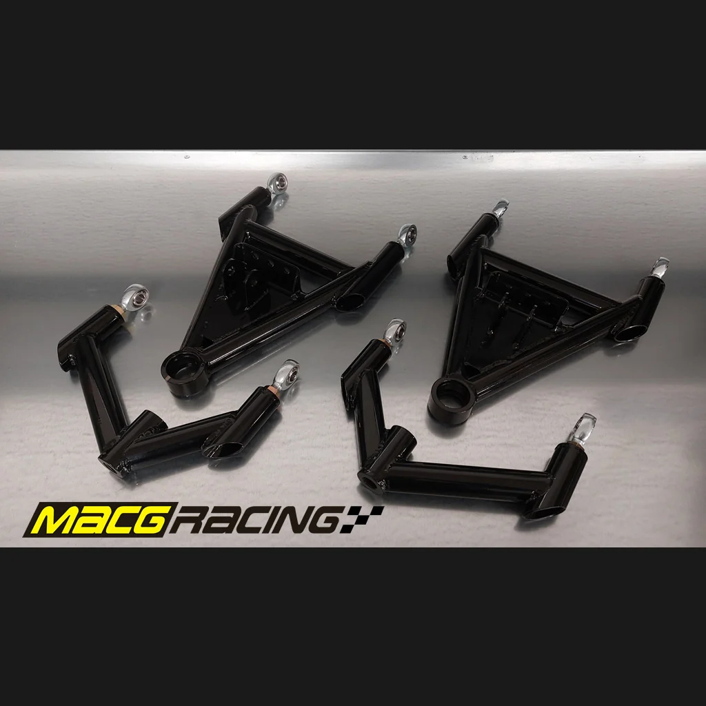 Four front wishbones and mounting hardware laid out together