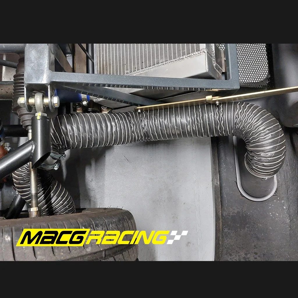 Brake duct hose installed behind an Ultima front wheel