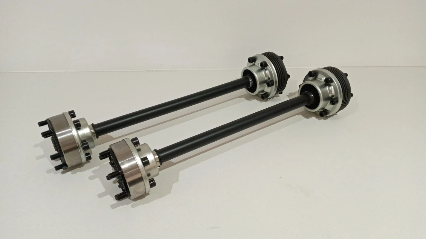 Pair of uprated driveshafts shown from the hub end