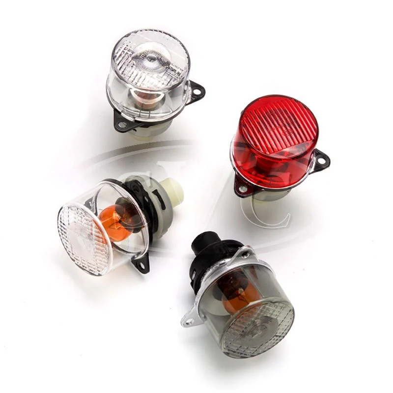 Clear, amber and red 55 mm inner lamp variants arranged together.