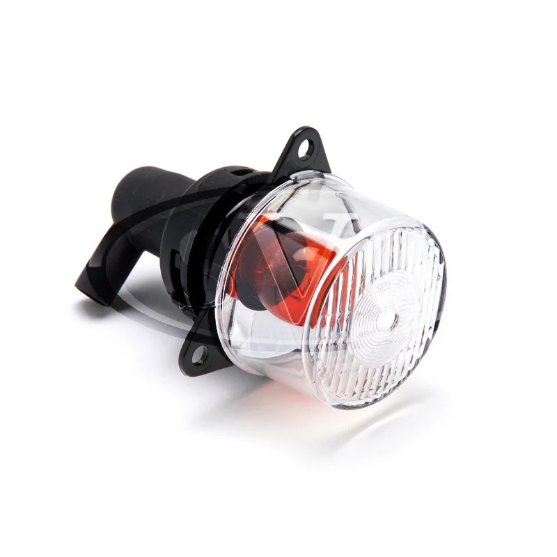 Clear 55 mm inner indicator lamp with its amber bulb visible.