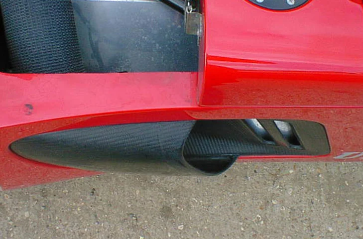 Lower profile of the fitted driver-side intake and its internal duct outlet.