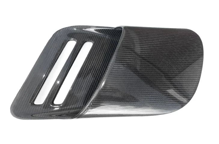 Passenger-side carbon-fibre intake duct viewed from the outer face.