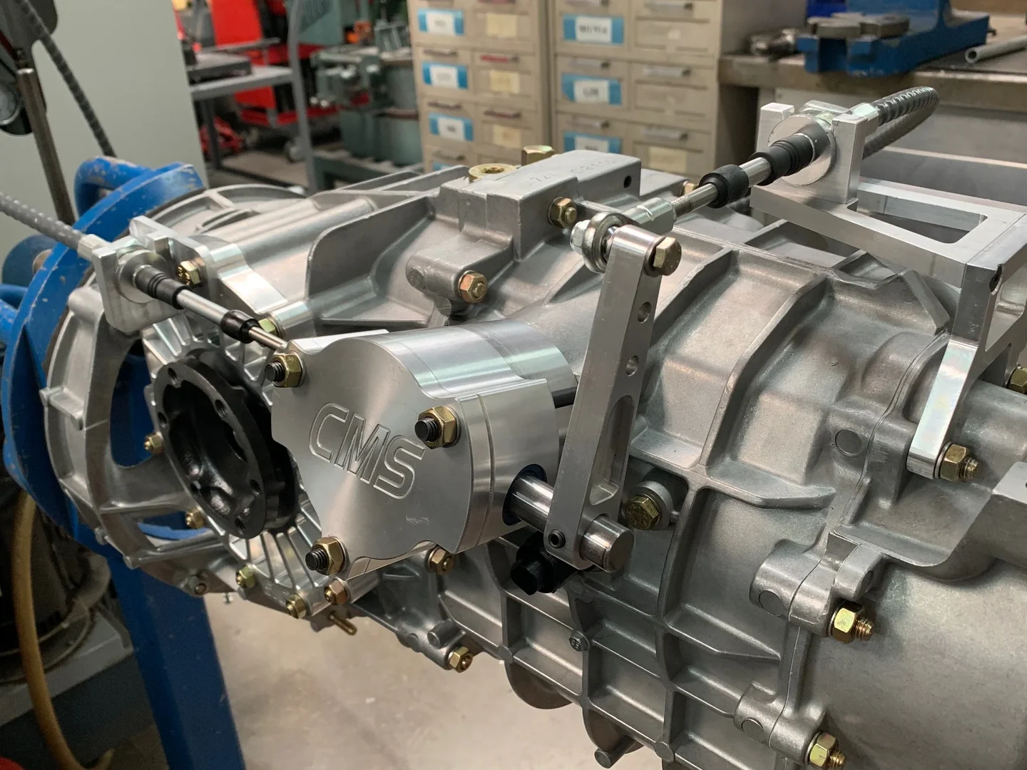 Three-quarter view of the fitted CMS side-shift mechanism and cable linkage.