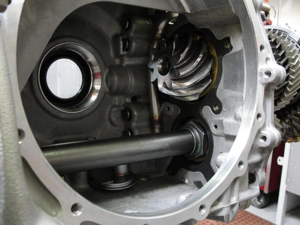 Open inverted GT2 or GT3 transaxle case showing the oil-pickup area before fitting.