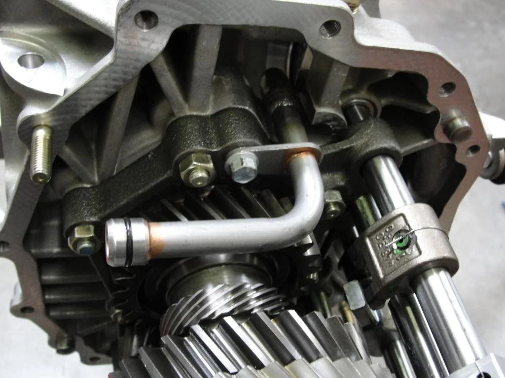 CMS custom oil-pickup tube installed inside an inverted GT2 or GT3 transaxle.