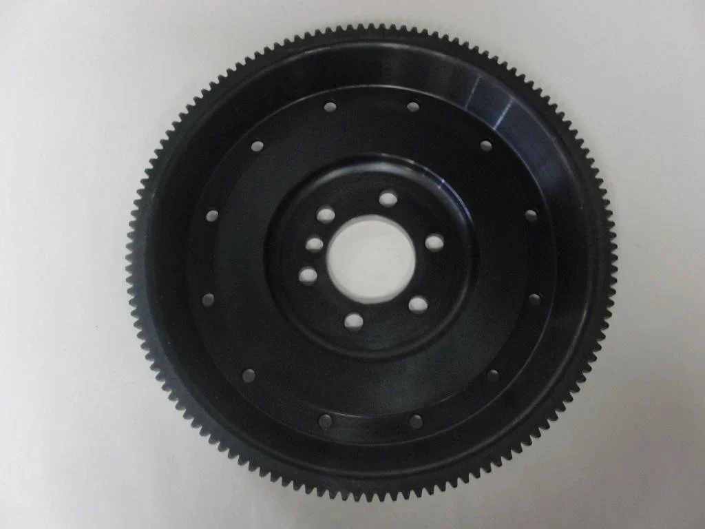 Front face of the black Tilton LS-to-G50 conversion flywheel.