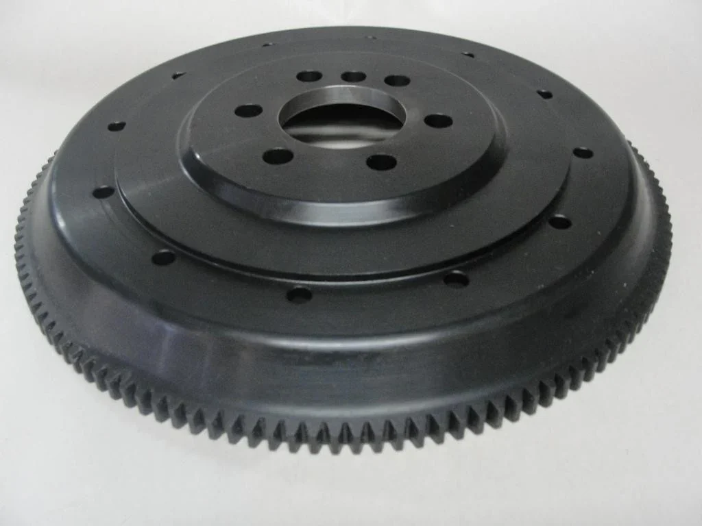 Rear face and raised mounting boss of the Tilton LS-to-G50 conversion flywheel.