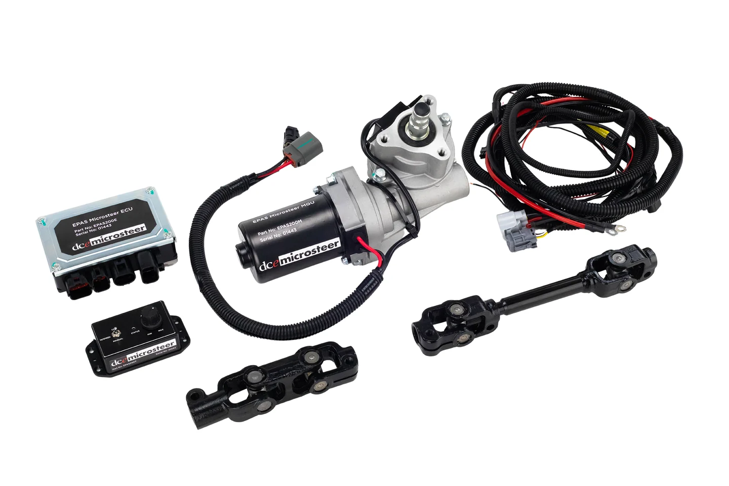 DCE Microsteer electric power-steering kit with motor, controller, shafts and wiring.